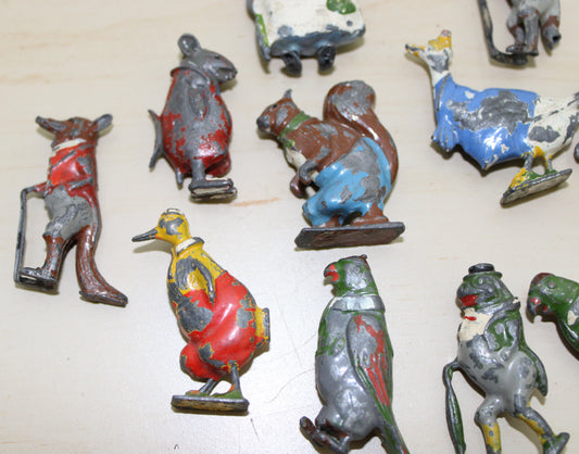 Collection of 11 Britains Cadburys Coco cubs lead figures