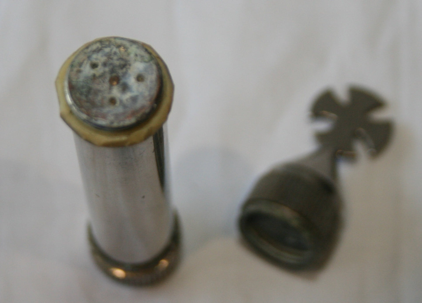Small pocket aspergillum with cross to top