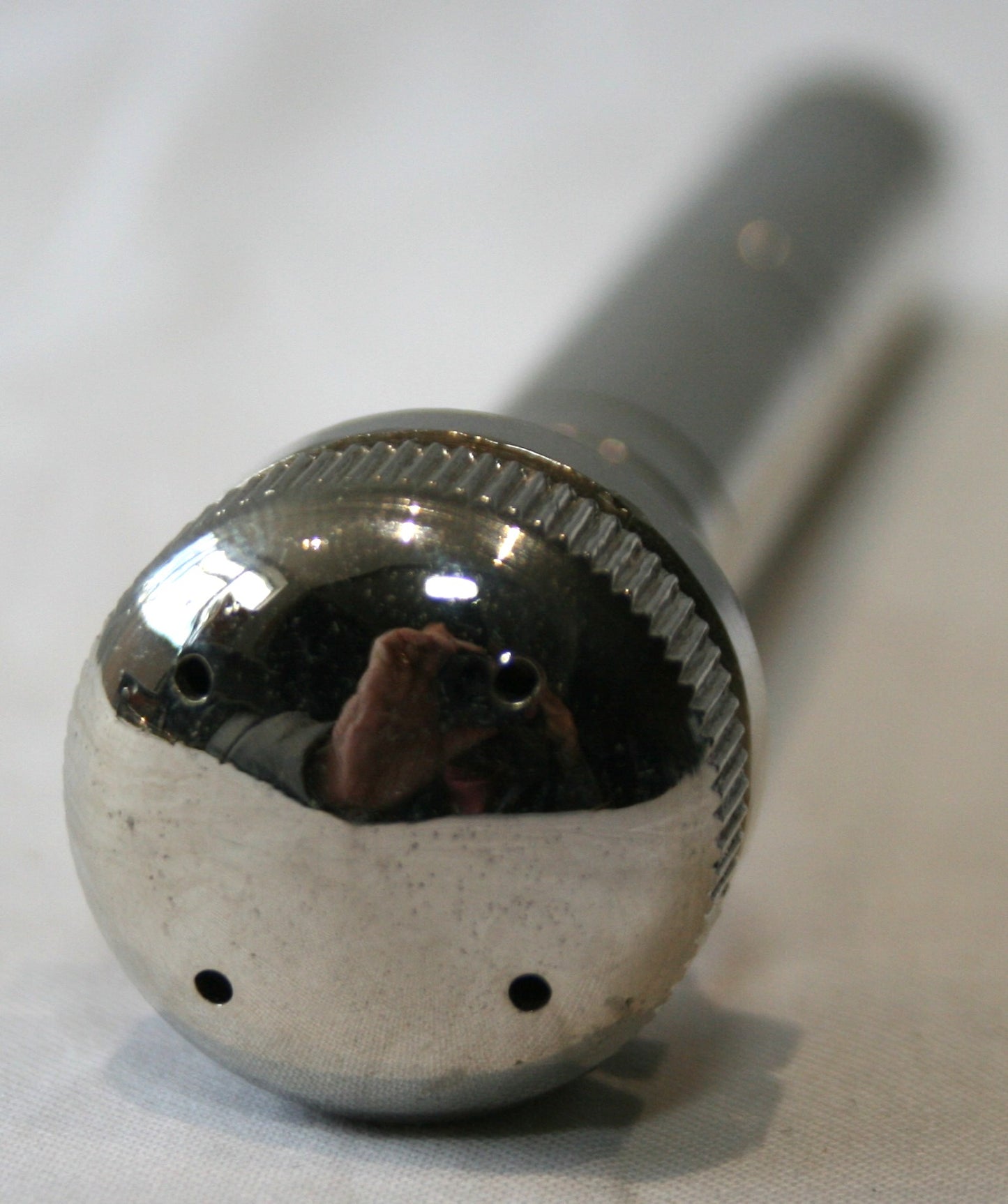 Small pocket aspergillum