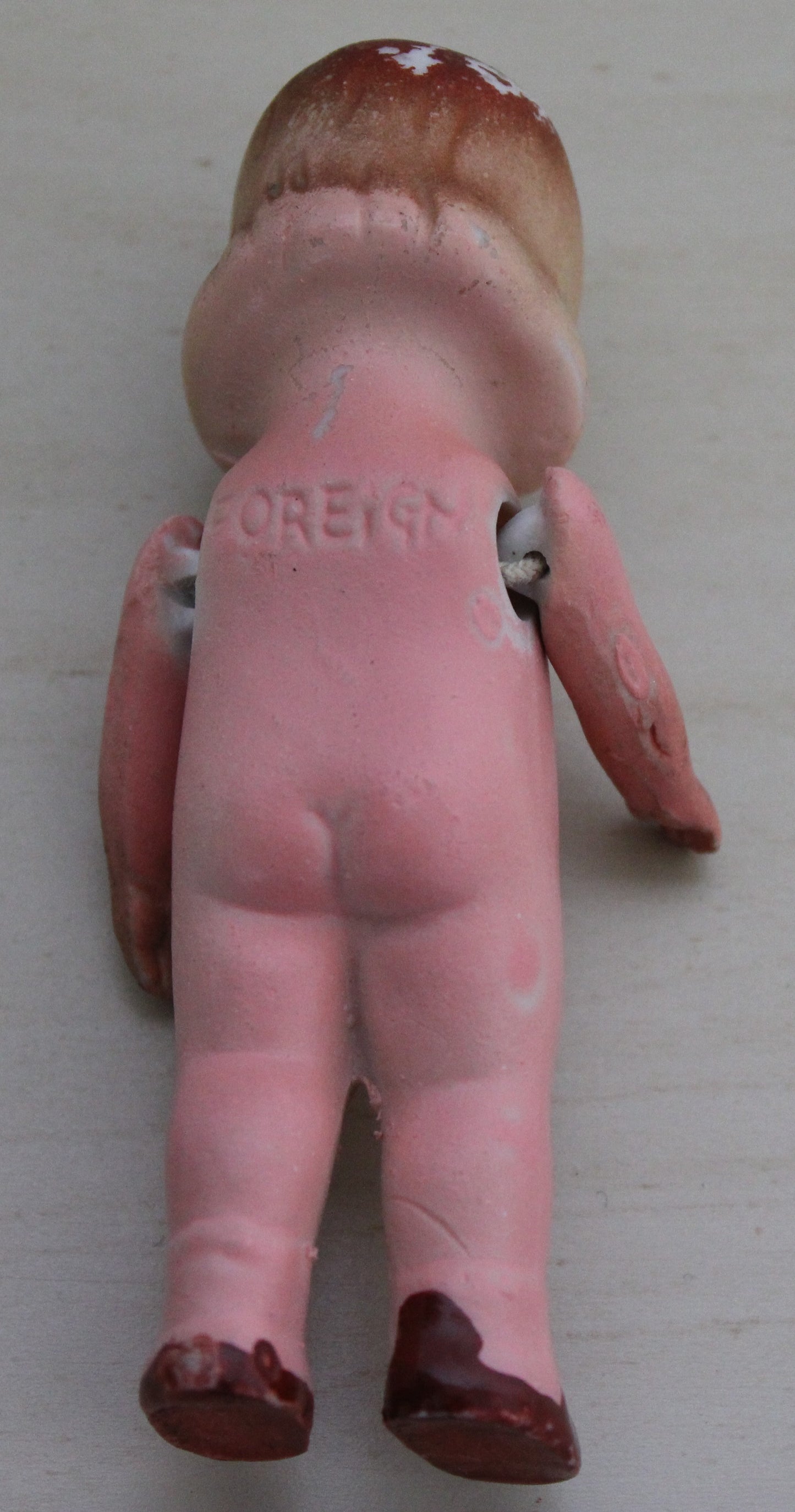1950s Foreign made bisque small doll with jointed arms
