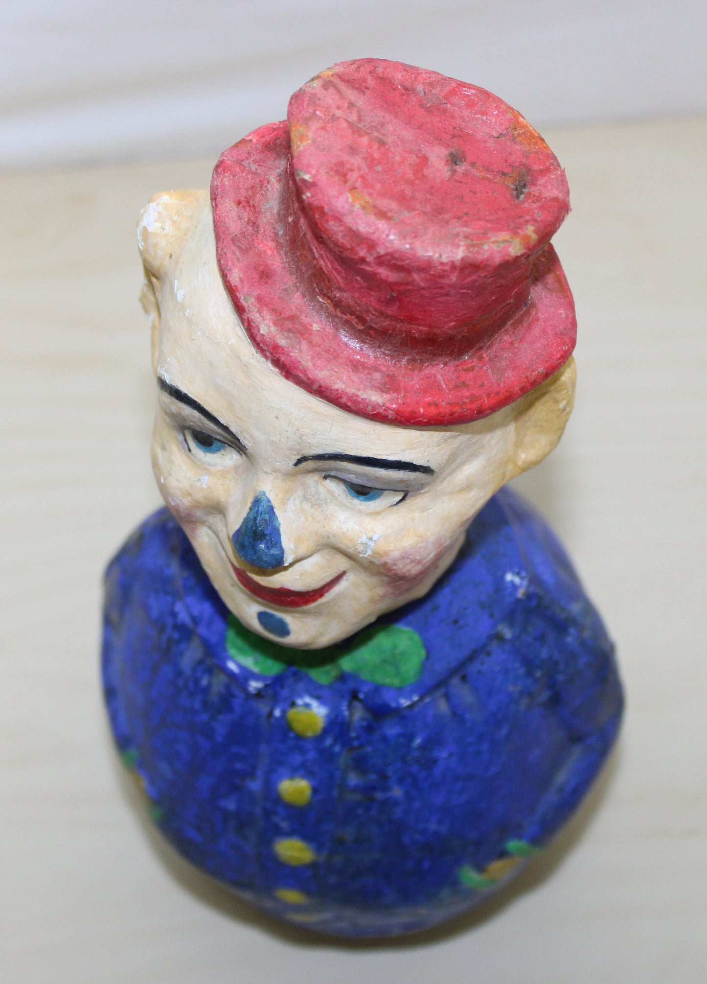 Antique papier-mache roly-poly clown toy