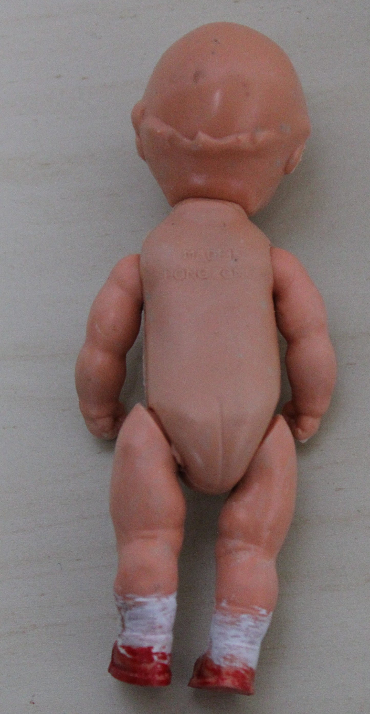 Small 1950s plastic male doll - Hong Kong