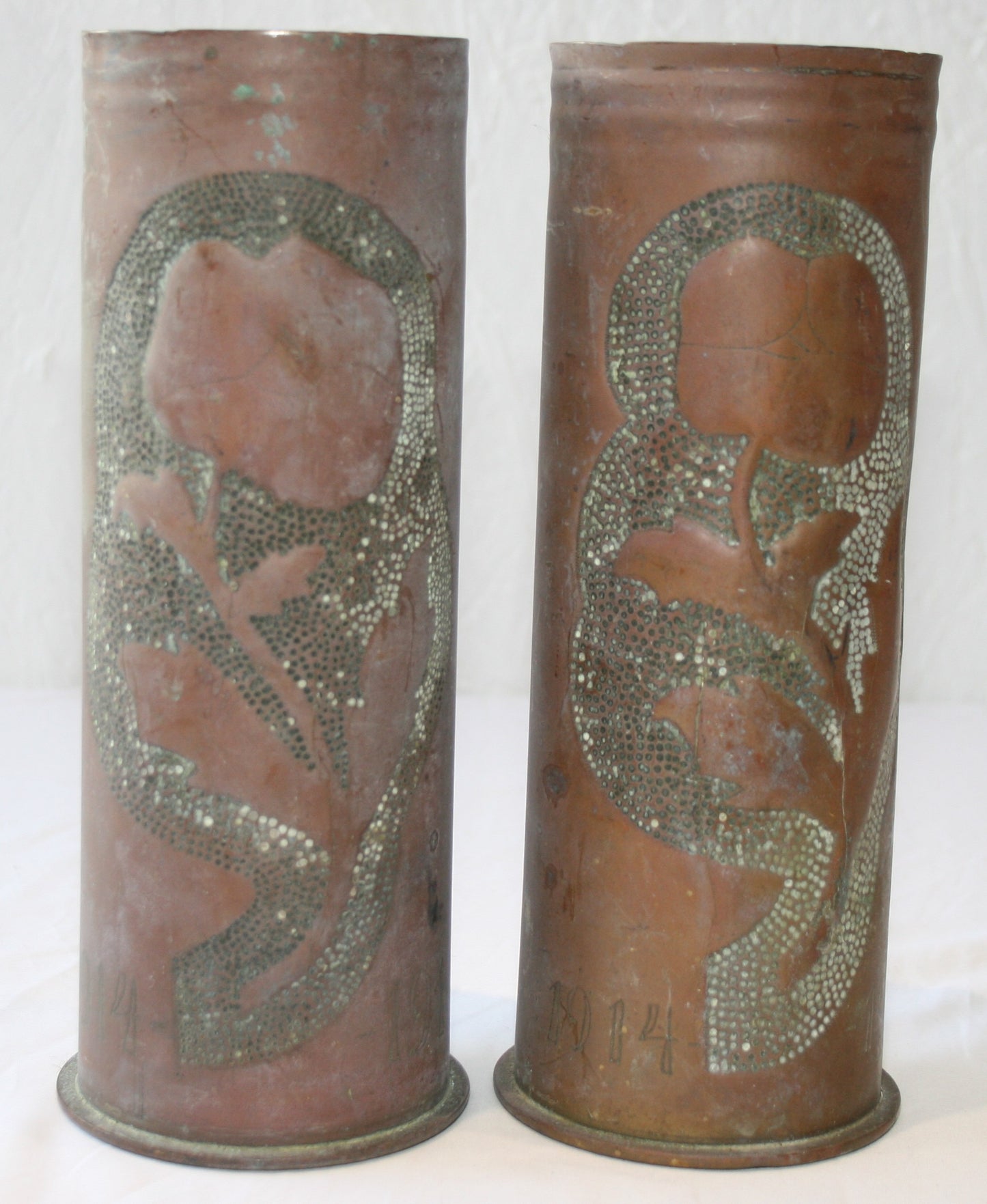 Pair of WWI shells decorated with poppies