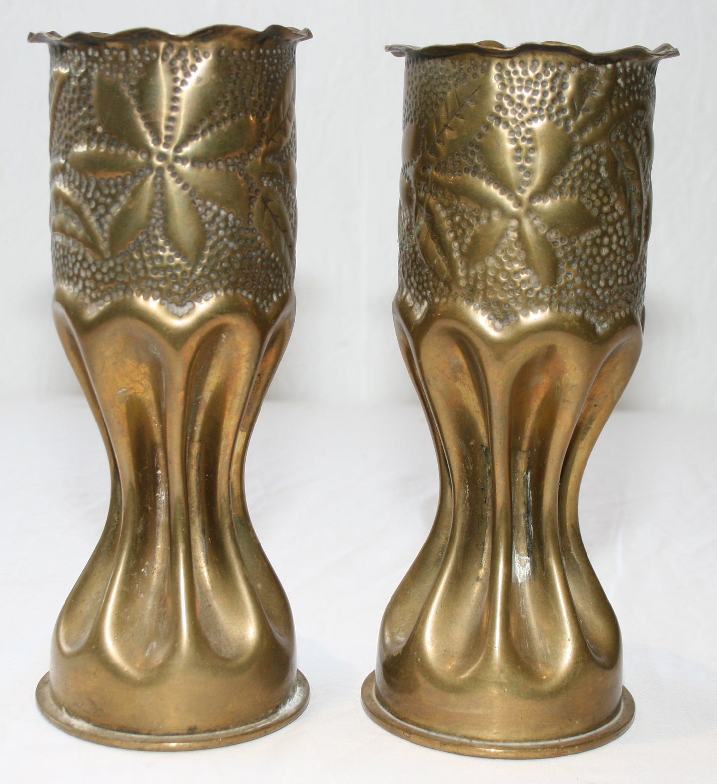 Pair of WWI fluted shells decorated with flowers