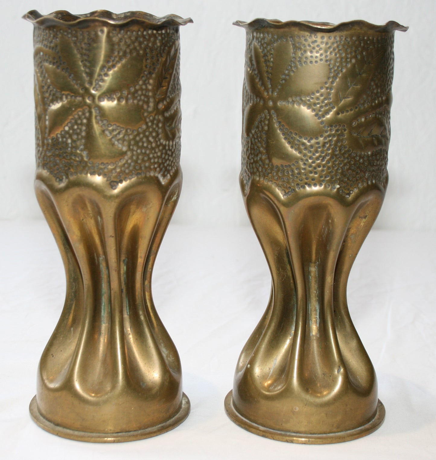 Pair of WWI fluted shells decorated with flowers