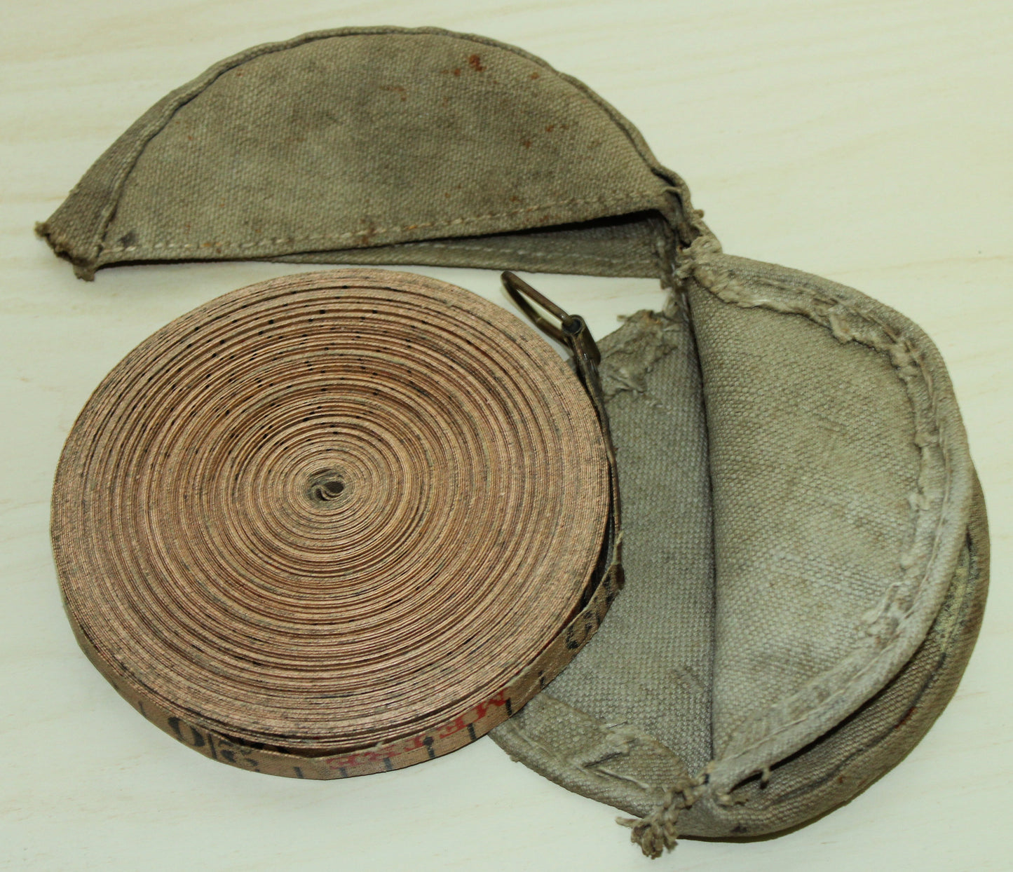 Vintage Rabone tape measure in canvas pouch