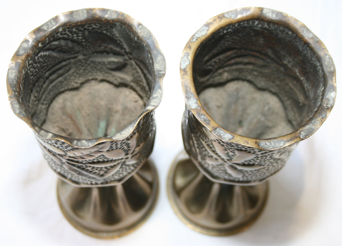 Pair of WWI fluted shells decorated with flowers