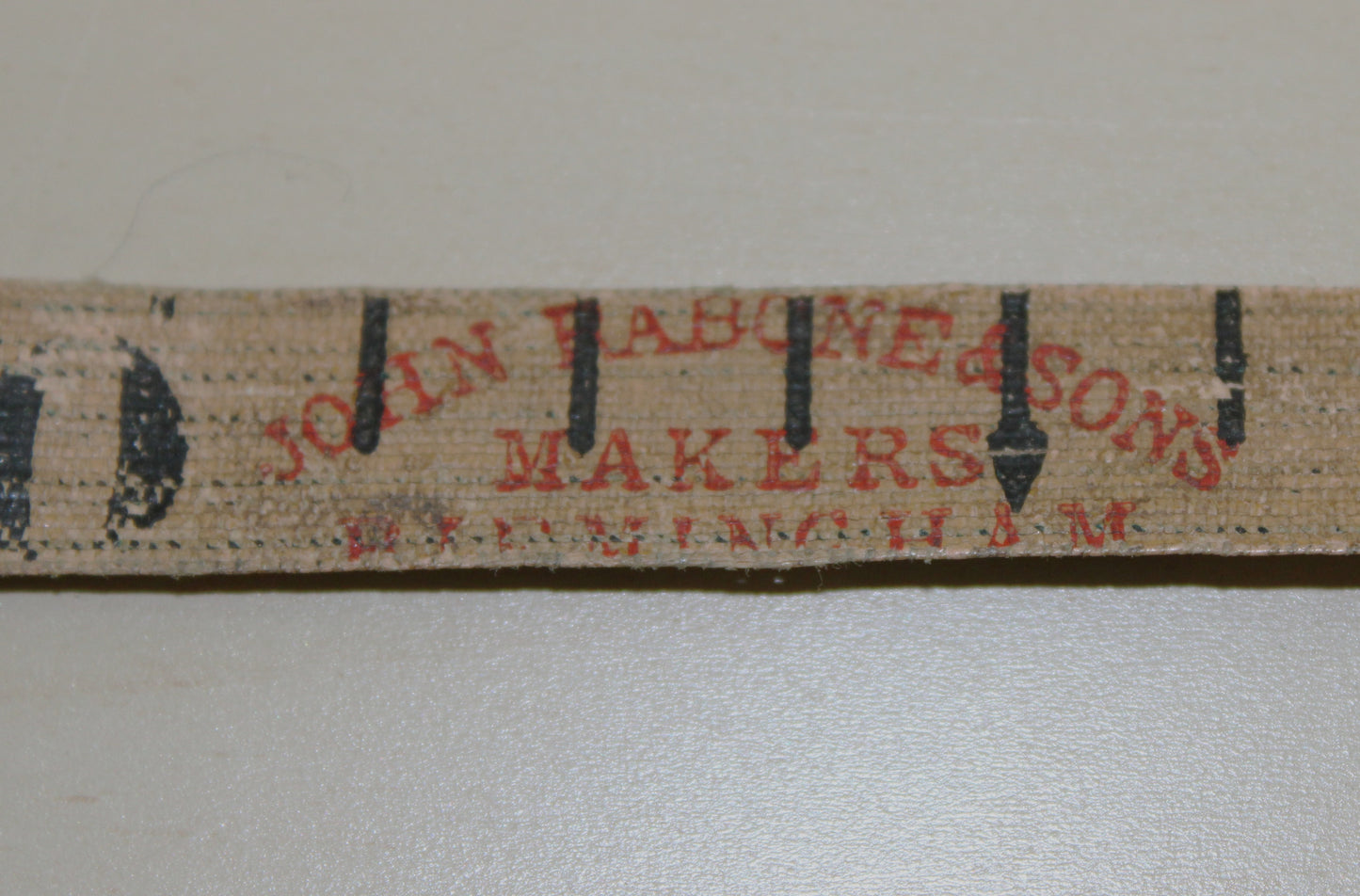 Vintage Rabone tape measure in canvas pouch