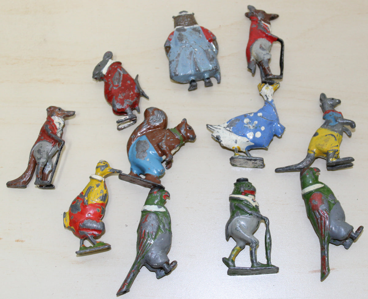 Collection of 11 Britains Cadburys Coco cubs lead figures