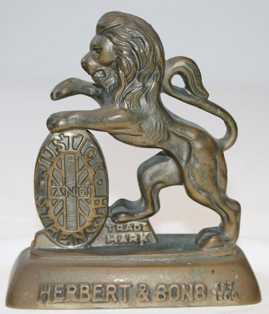 Antique brass Herbert & Sons lion trademark paperweight