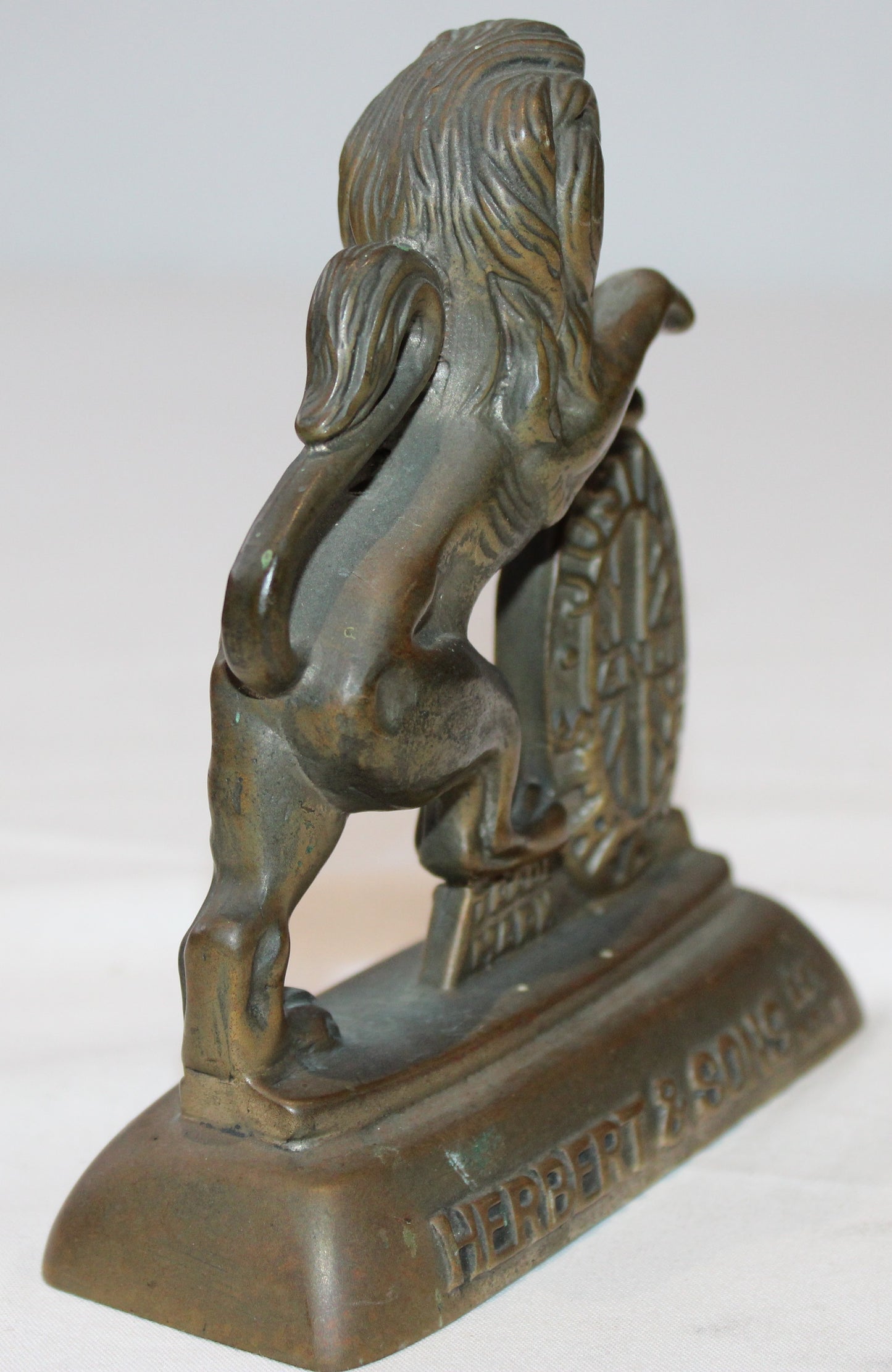 Antique brass Herbert & Sons lion trademark paperweight