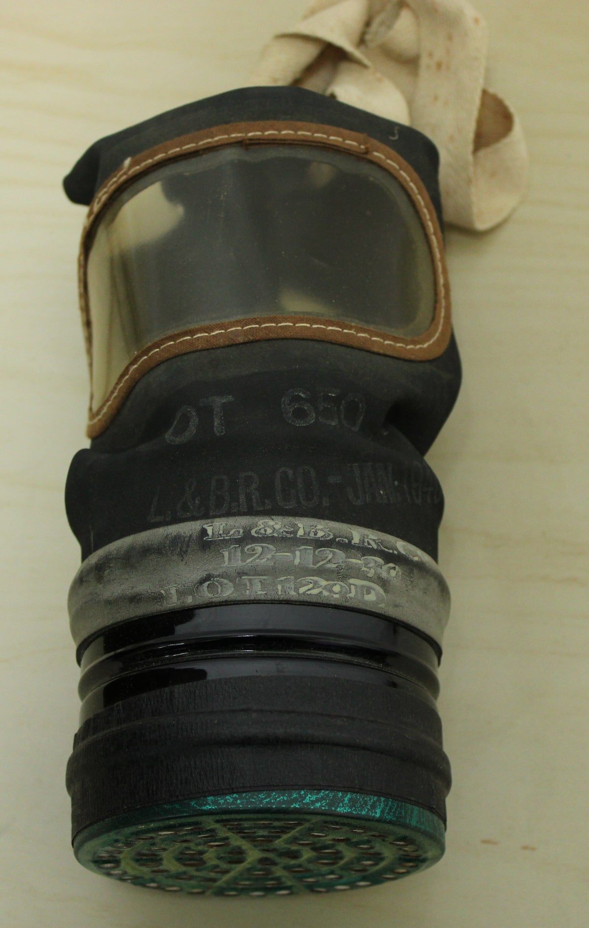 1940 dated British civilian issue respirator and original tin