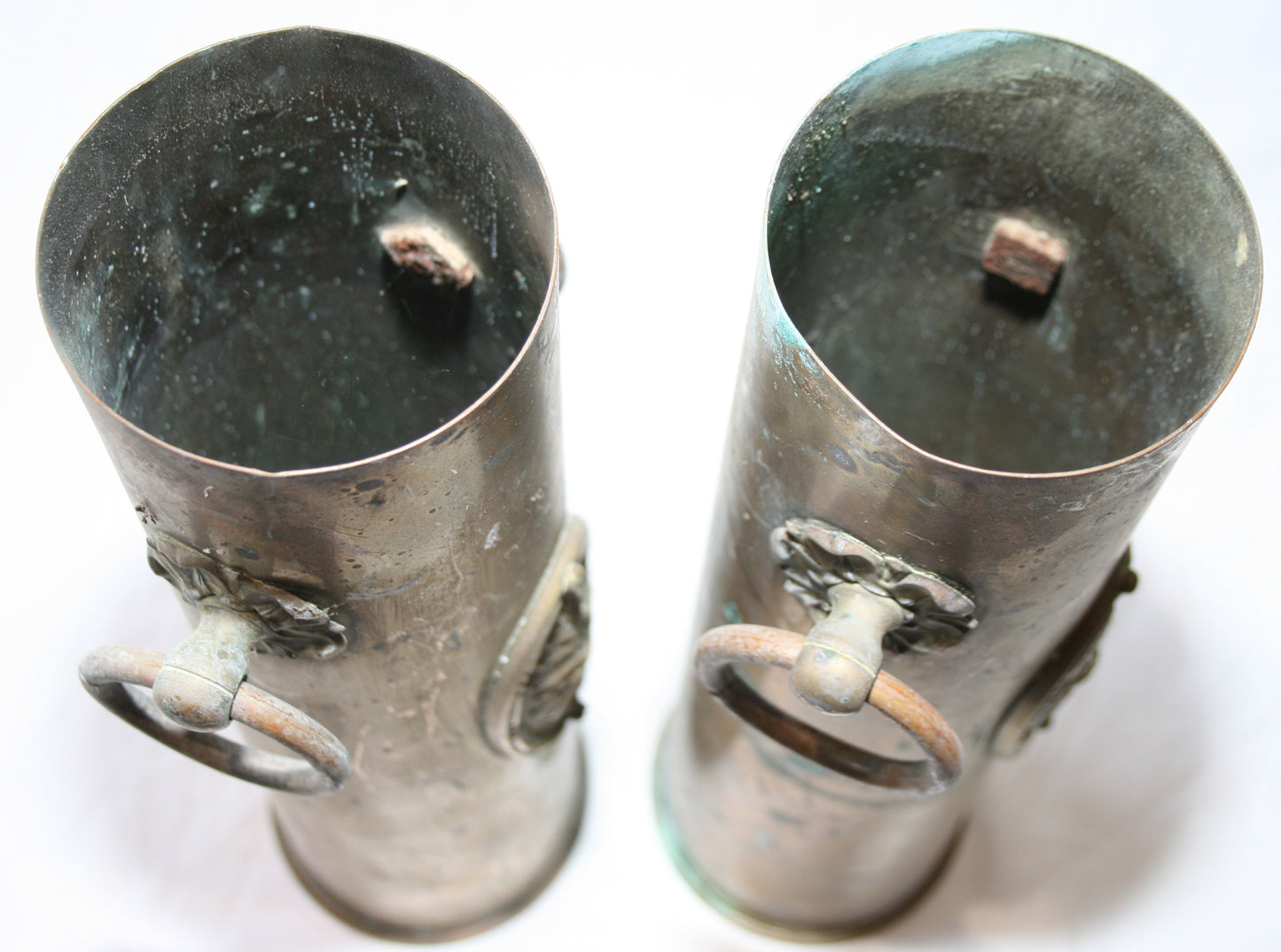 Pair of WWI 13 lb shells decorated with cartouche and handles