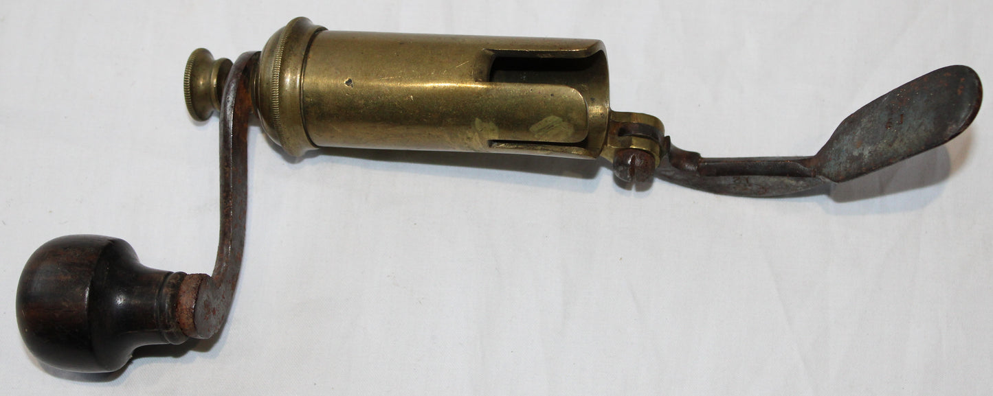 Antique shotgun cartridge percussion cap holder tool