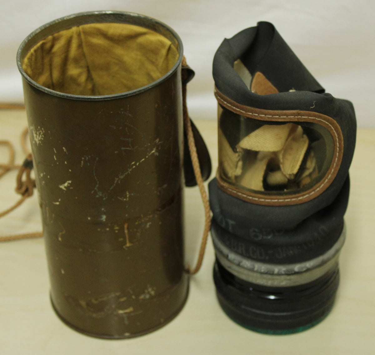 1940 dated British civilian issue respirator and original tin