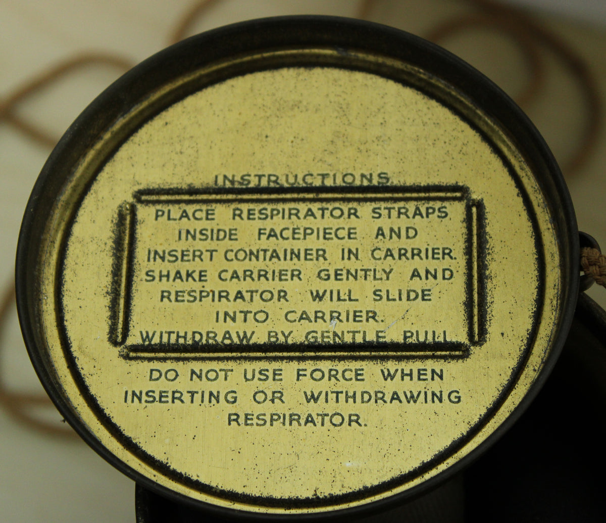 1940 dated British civilian issue respirator and original tin