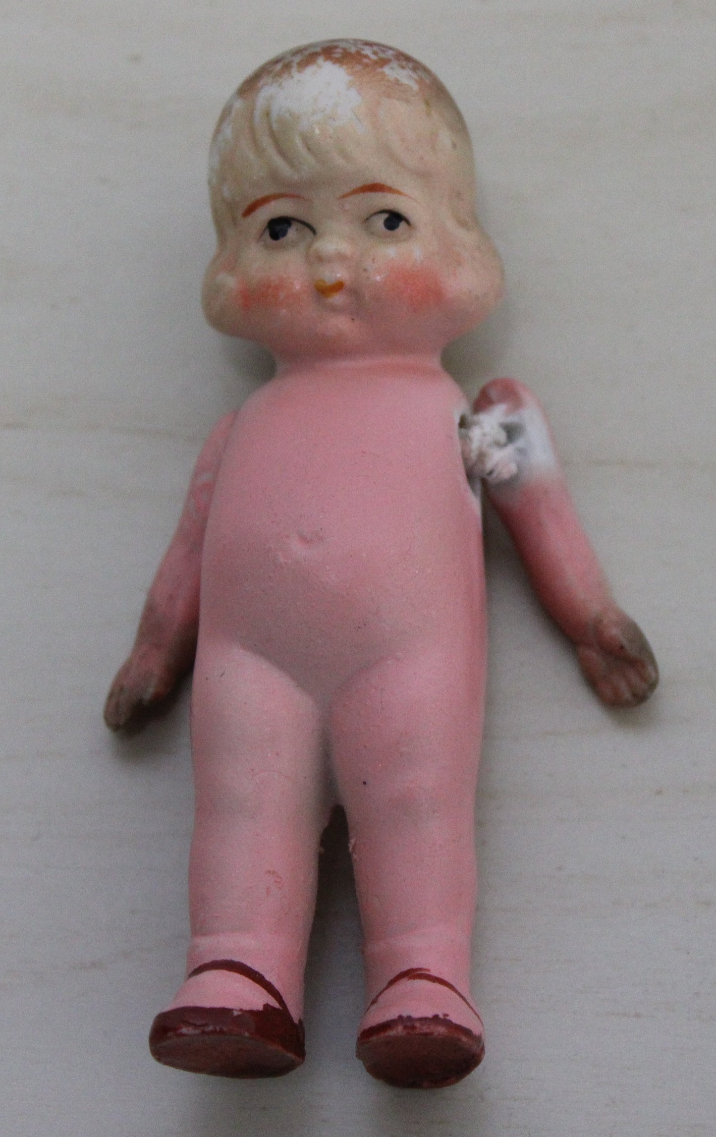 1950s Foreign made bisque small doll with jointed arms