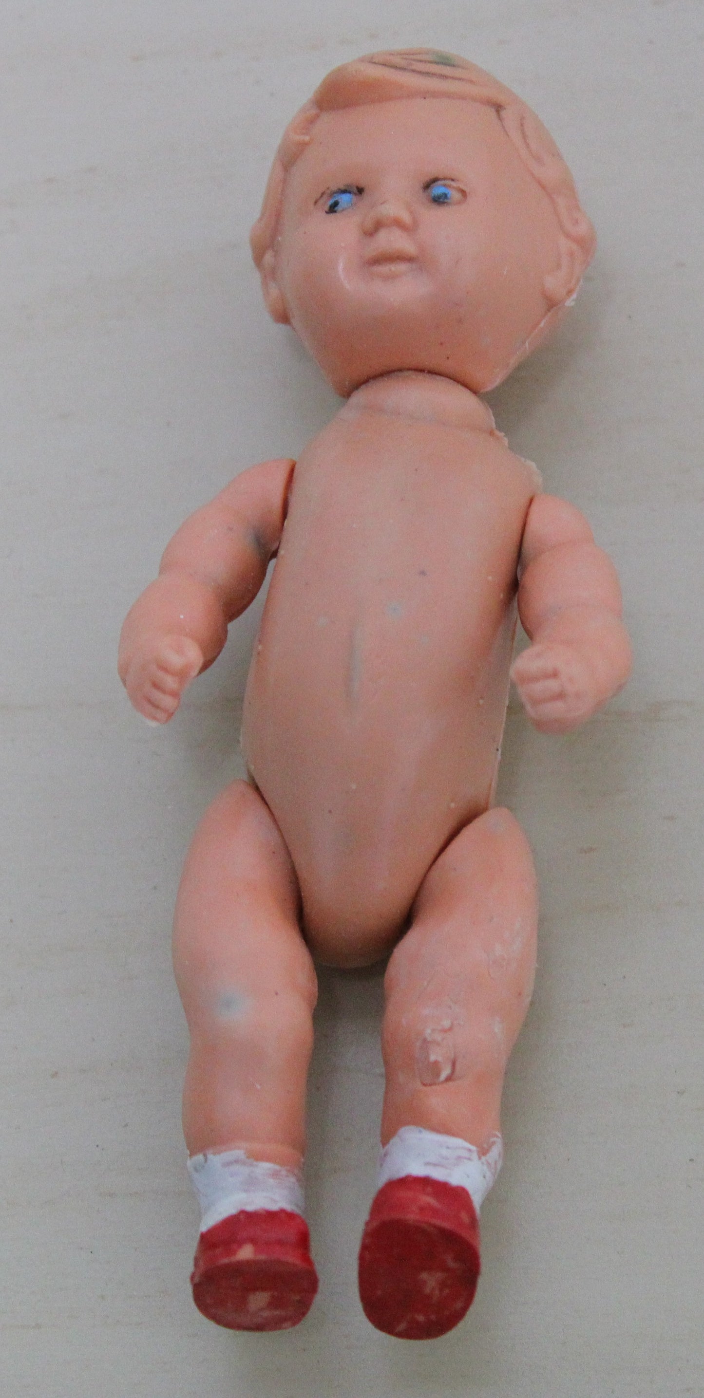 Small 1950s plastic male doll - Hong Kong