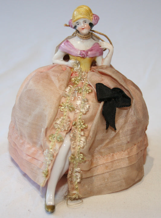 Beautiful vintage doll pin cushion