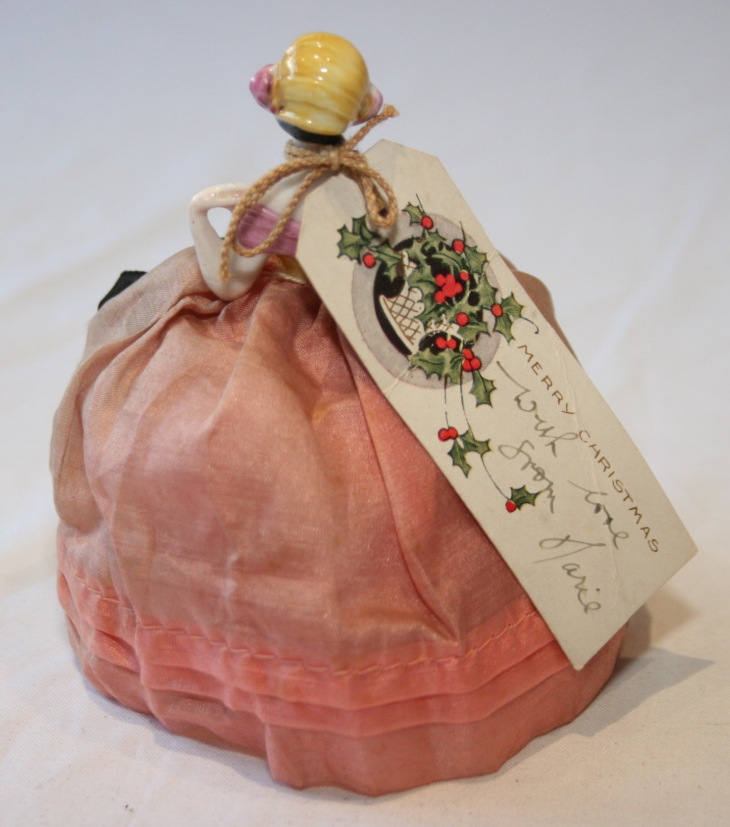 Beautiful vintage doll pin cushion