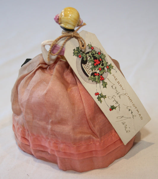 Beautiful vintage doll pin cushion