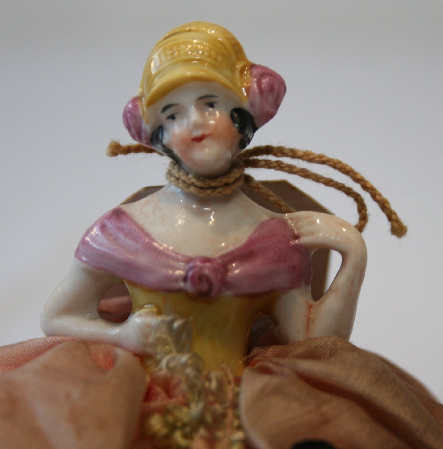 Beautiful vintage doll pin cushion