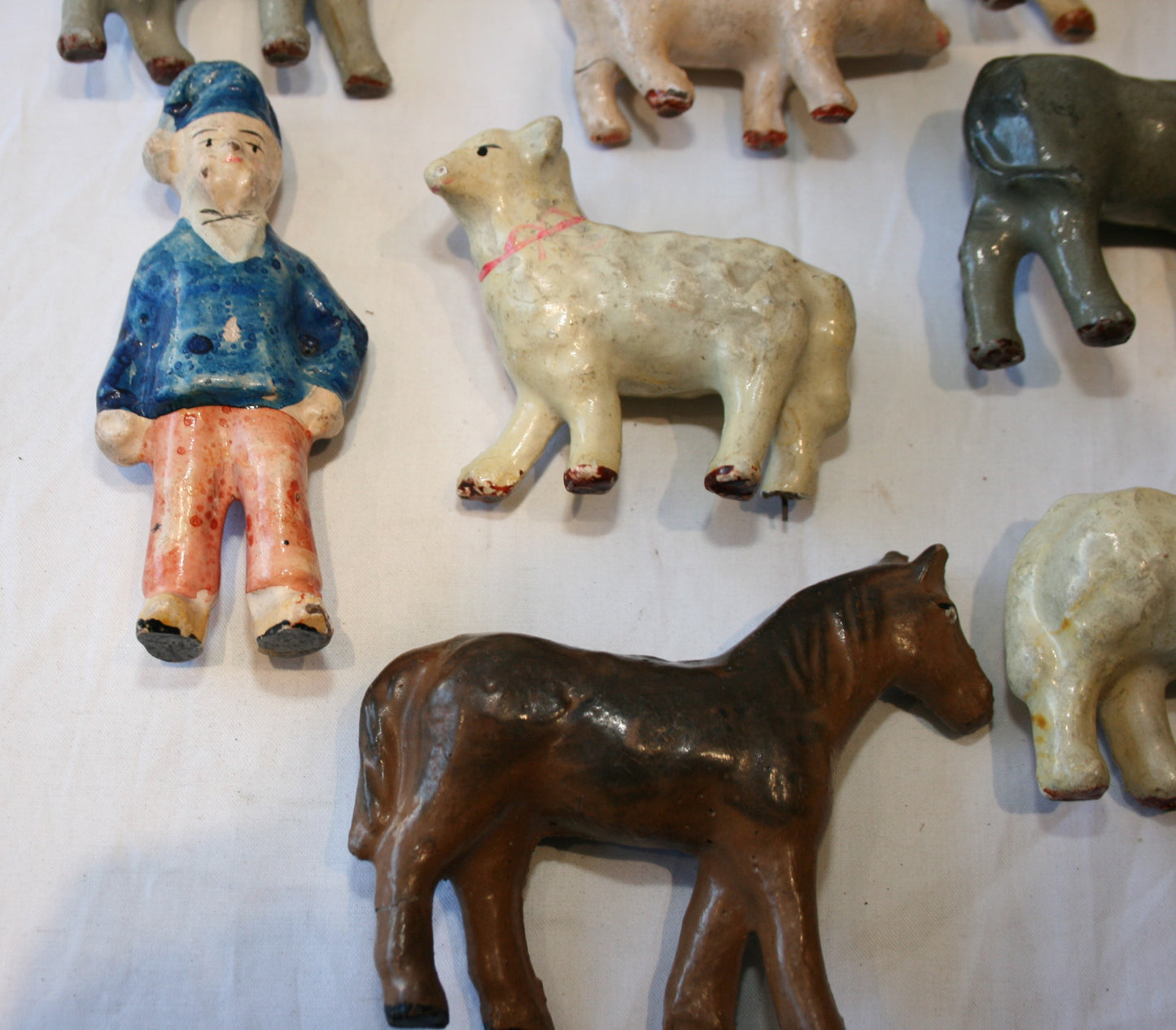 Collection of old French toy animals and farmer